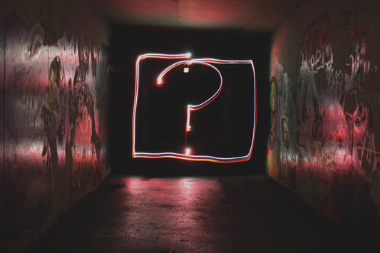 Neon Graffiti Question Mark. Photo by Emily Morter on Unsplash